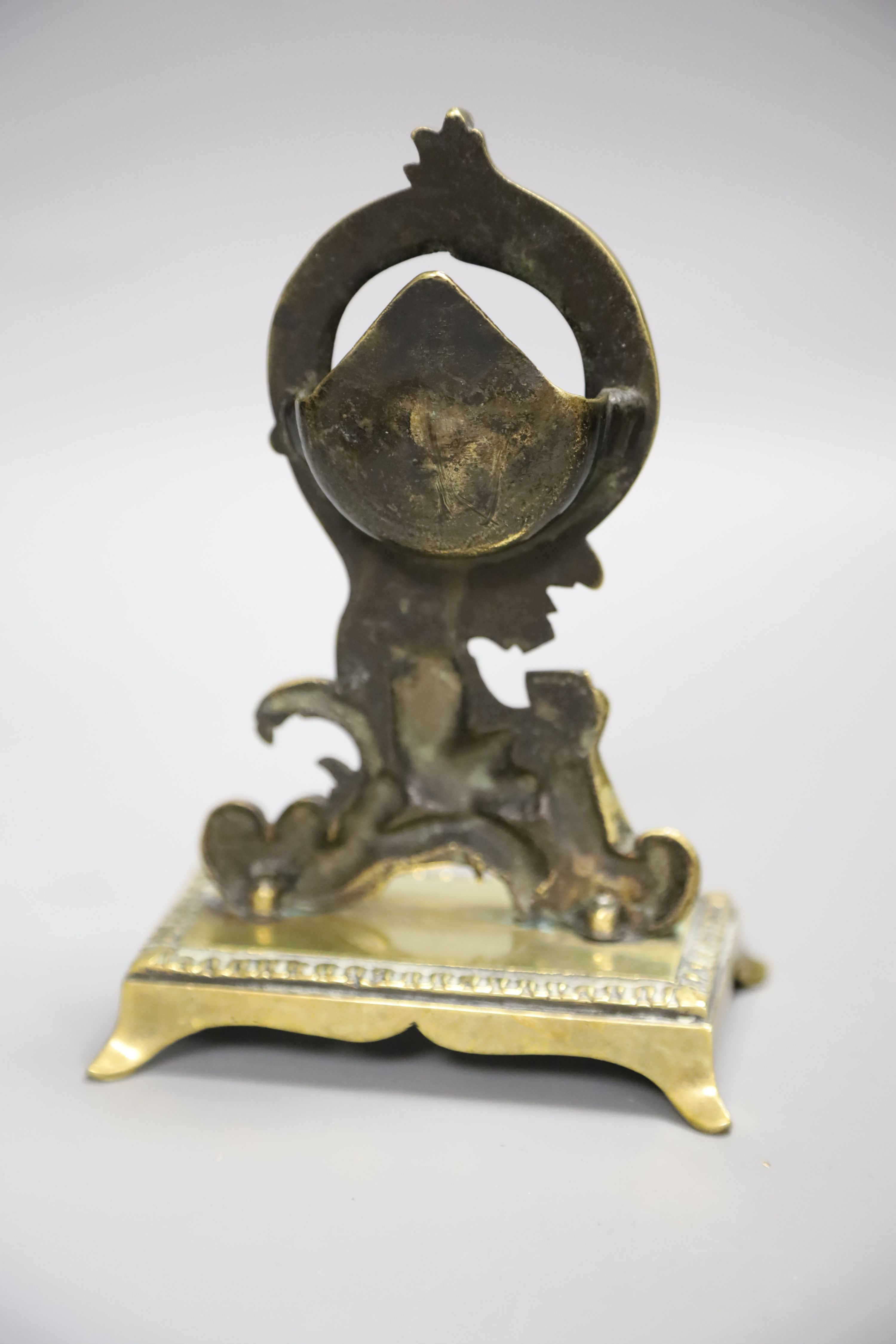 A brass pocket watch holder, height 17cm